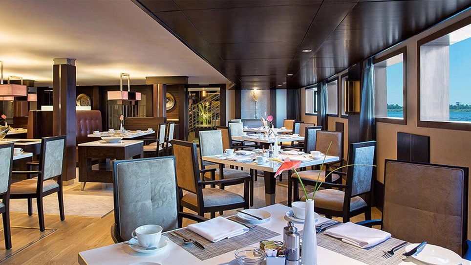 Our elegant main restaurant is decorated in a delicate natural palette and afforded spectacular River Nile views.